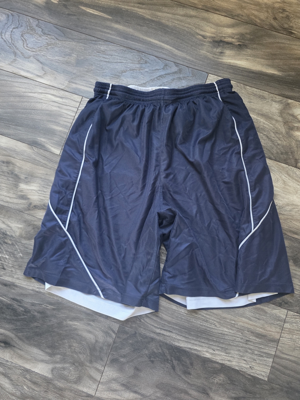 Sport-Tek navy athletic shorts with white piping